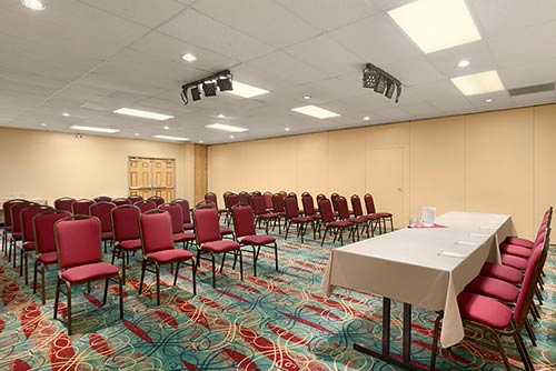 A spacious meeting room at the Days Inn Stephenville hotel located near the Stephenville airport