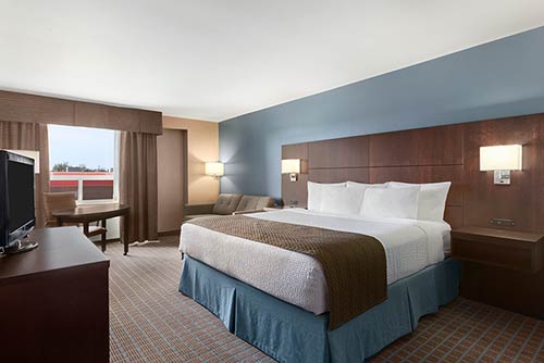 A spacious executive suite at the Days Inn Stephenville hotel located near the Stephenville Theatre Festival
