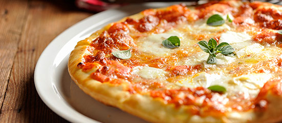 A pizza signifying the variety of restaurants located near the Days Inn Stephenville hotel